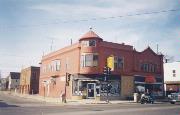 300 N COMMERCIAL ST, a Queen Anne large retail building, built in Neenah, Wisconsin in 1879.