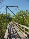 ACROSS EAU CLAIRE RIVER, N OF BOYD PARK PLAYGROUND, a NA (unknown or not a building) bridge, built in Eau Claire, Wisconsin in 1932.