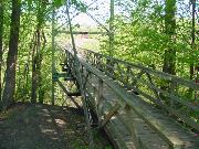 ACROSS EAU CLAIRE RIVER, N OF BOYD PARK PLAYGROUND, a NA (unknown or not a building) bridge, built in Eau Claire, Wisconsin in 1932.