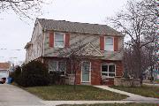 1242 E COURTLAND PL, a Colonial Revival/Georgian Revival house, built in Whitefish Bay, Wisconsin in 1951.