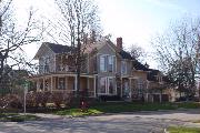 409 S 1ST ST, a Queen Anne house, built in Evansville, Wisconsin in 1885.