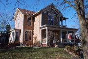 409 S 1ST ST, a Queen Anne house, built in Evansville, Wisconsin in 1885.