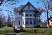 419 S 1ST ST, a Queen Anne house, built in Evansville, Wisconsin in 1885.