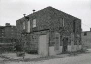 120 S WISCONSIN ST, a Astylistic Utilitarian Building fishing shed, built in Port Washington, Wisconsin in 1924.