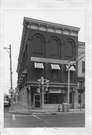 300 E MAIN ST, a Italianate small retail building, built in Watertown, Wisconsin in 1856.