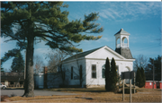 49 WISCONSIN DELLS PARKWAY SOUTH, a Greek Revival school-one to six room, built in Lake Delton, Wisconsin in 1854.