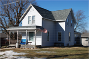 702 E CHERRY ST, a Queen Anne house, built in Lancaster, Wisconsin in 1890.
