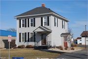 1001 N MADISON ST, a Two Story Cube house, built in Lancaster, Wisconsin in 1900.