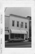 128 E MAIN ST 128 E MAIN ST, a Commercial Vernacular small retail building, built in Mount Horeb, Wisconsin in 1905.