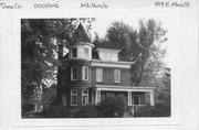 409 E MAIN ST, a Queen Anne house, built in Mount Horeb, Wisconsin in 1895.