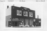 203 W MAIN ST, a Twentieth Century Commercial automobile showroom, built in Mount Horeb, Wisconsin in 1917.