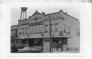 104 JANESVILLE ST, a Romanesque Revival retail building, built in Oregon, Wisconsin in 1898.