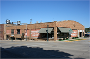 30 E SUMNER ST / 15 MILL ST, a Commercial Vernacular automobile showroom, built in Hartford, Wisconsin in 1929.