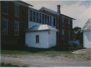 unknown, a Colonial Revival/Georgian Revival house, built in Ellsworth, Wisconsin in 1873.