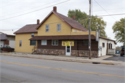 EAST SIDE OF MILITARY RD, NEXT TO N384, a Gabled Ell tavern/bar, built in Sherwood, Wisconsin in 1897.