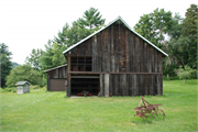 W5539 and W5565 County Rd MM, a Astylistic Utilitarian Building barn, built in Shelby, Wisconsin in 1998.