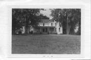5941 STH 113, a Gabled Ell house, built in Westport, Wisconsin in 1860.
