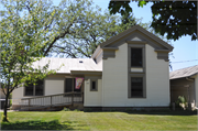NW CORNER CAMBRIDGE ST AND DIVISION ST, a Greek Revival school – elem/middle/jr high/high, built in Wautoma, Wisconsin in 1870.