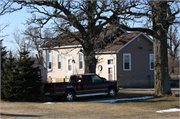 6527 W US HWY 14, a Front Gabled school-one to six room, built in Janesville, Wisconsin in 1870.