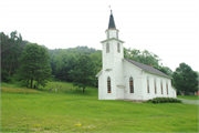 6757 COUNTY HIGHWAY P, E SIDE, .6 MILE N OF DRY DOG RD, a Early Gothic Revival house of worship, built in Pulaski, Wisconsin in 1874.