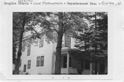END OF W 1ST AVE AT N POINT INTO LAKE NEBAGAMON IN CENTER OF CAMP NEBAGAMON, a American Foursquare house, built in Lake Nebagamon, Wisconsin in 1898.