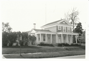 532 W WISCONSIN ST, a Greek Revival house, built in Portage, Wisconsin in 1855.