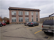 105 E 12th St, a Neoclassical/Beaux Arts industrial bldg/manufacturing facility, built in Clintonville, Wisconsin in 1911.
