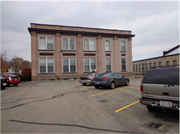 105 E 12th St, a Neoclassical/Beaux Arts industrial building, built in Clintonville, Wisconsin in 1911.