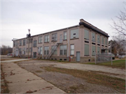 105 E 12th St, a Neoclassical/Beaux Arts industrial bldg/manufacturing facility, built in Clintonville, Wisconsin in 1911.