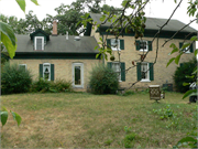 N1220 County Rd H, a Greek Revival house, built in Genoa City, Wisconsin in 1862.