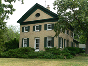 N1220 County Rd H, a Greek Revival house, built in Genoa City, Wisconsin in 1862.