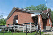 772 KOSHKONONG RD, a Gabled Ell one to six room school, built in Christiana, Wisconsin in 1921.