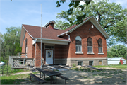 772 KOSHKONONG RD, a Gabled Ell one to six room school, built in Christiana, Wisconsin in 1921.