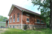 772 KOSHKONONG RD, a Gabled Ell school-one to six room, built in Christiana, Wisconsin in 1921.