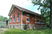 772 KOSHKONONG RD, a Gabled Ell one to six room school, built in Christiana, Wisconsin in 1921.