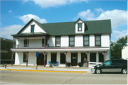226 W WHITEWATER ST, a Queen Anne retail building, built in Whitewater, Wisconsin in 1894.