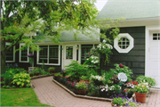 512 QUENTIN AVE, a Colonial Revival/Georgian Revival house, built in Marshfield, Wisconsin in 1927.