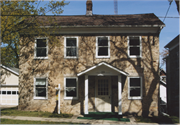 216 W JEFFERSON, a Greek Revival house, built in Burlington, Wisconsin in 1850.