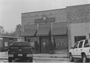 123 S MAIN ST, a Commercial Vernacular small retail building, built in Oregon, Wisconsin in 1880.