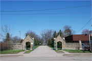 CA.2825 CHURCH ST, a Early Gothic Revival fence/wall, built in Stevens Point, Wisconsin in 1920.