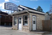 10647 N Bay Shore Dr, a Rustic Style gas station/service station, built in Sister Bay, Wisconsin in 1933.