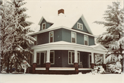 122 SUMMIT ST, a American Foursquare house, built in Spooner, Wisconsin in 1902.