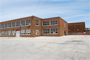 Oconomowoc High School, a Building.