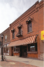 322 WATER ST, a Italianate small retail building, built in Eau Claire, Wisconsin in 1869.