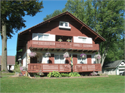 Hediger, Herman M. and Hanna, House, a Building.