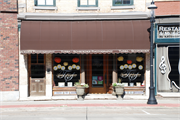 106 S BROADWAY, a Commercial Vernacular retail building, built in De Pere, Wisconsin in 1882.