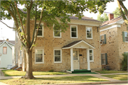 216 W JEFFERSON, a Greek Revival house, built in Burlington, Wisconsin in 1850.