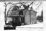 116 S MADISON ST, a Queen Anne house, built in Stoughton, Wisconsin in 1909.