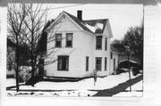 100 S MADISON ST, a Queen Anne house, built in Stoughton, Wisconsin in 1900.