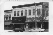 120-130 E MAIN ST, a Italianate small retail building, built in Stoughton, Wisconsin in 1884.